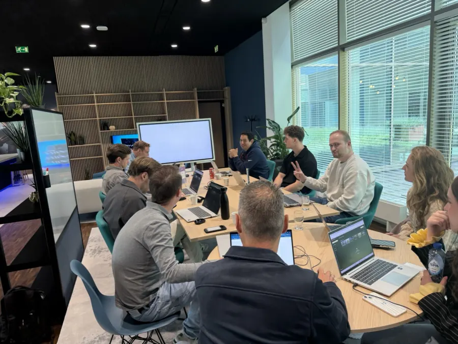 The advanced class gathered around a screen
